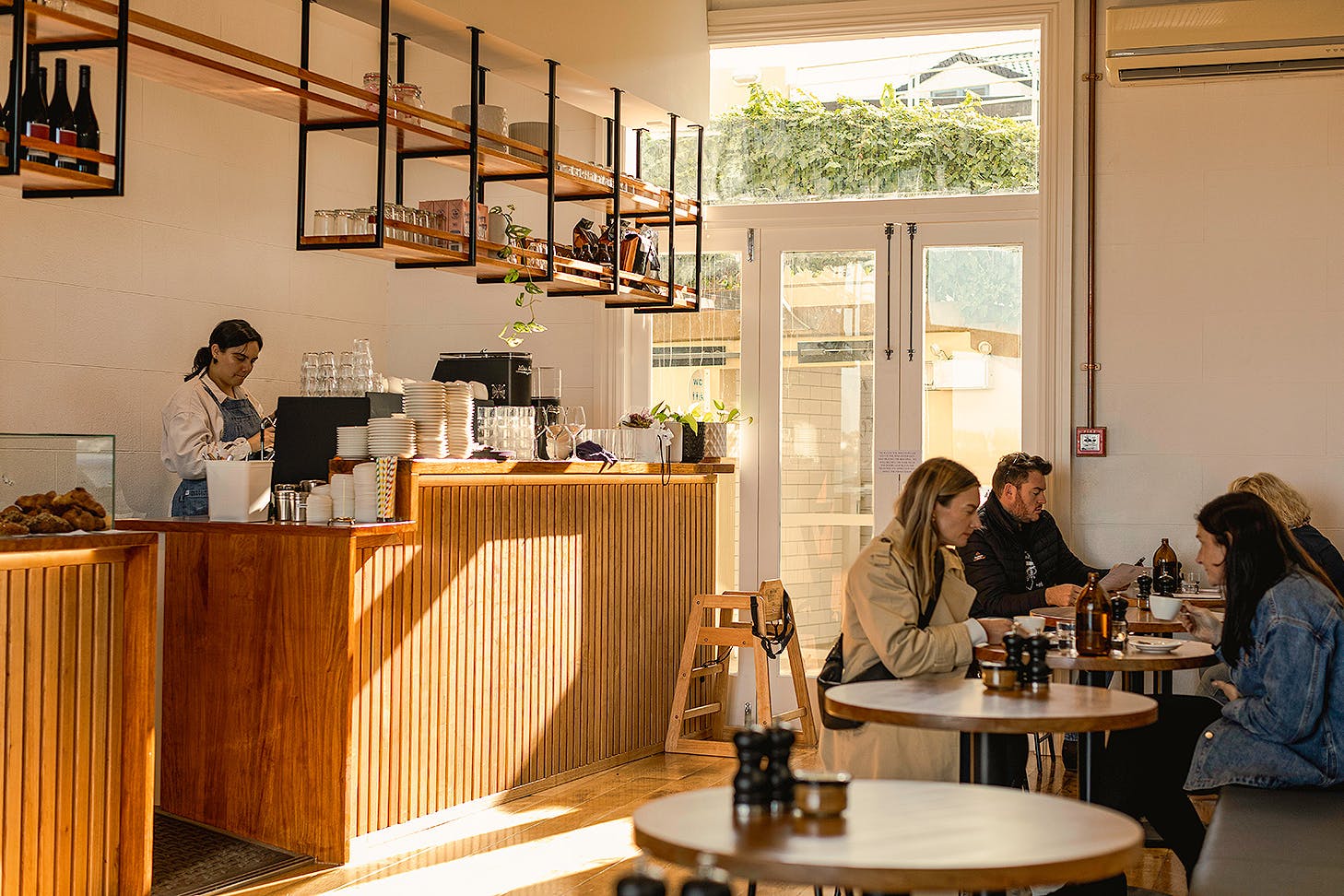 The light and bright dining room at Dulcie Eatery, one of the best cafes in Devonport.
